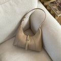 Aura Bags Chic Minimalist Beige Crescent Shoulder Bag with Buckle Detail