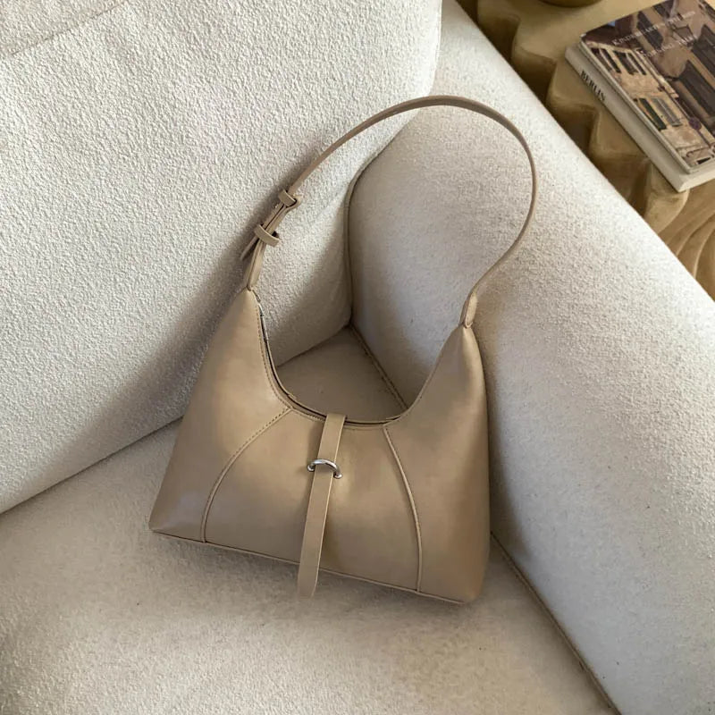 Aura Bags Chic Minimalist Beige Crescent Shoulder Bag with Buckle Detail