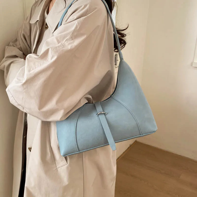 Aura Bags Chic Minimalist Beige Crescent Shoulder Bag with Buckle Detail