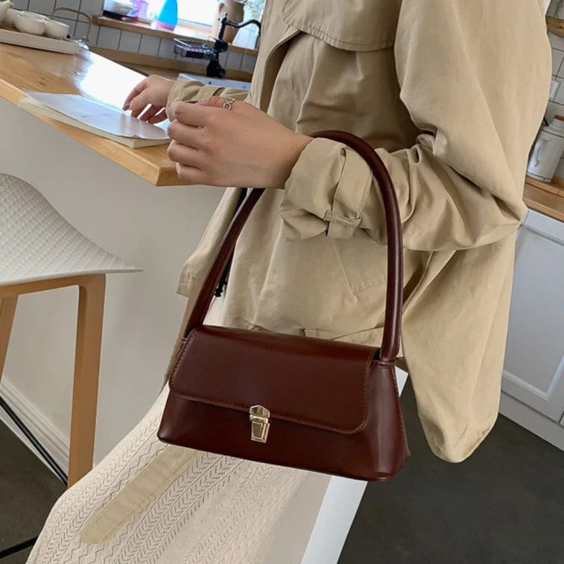 Minimalist Beige Leather Baguette Shoulder Bag with Gold Lock Accent