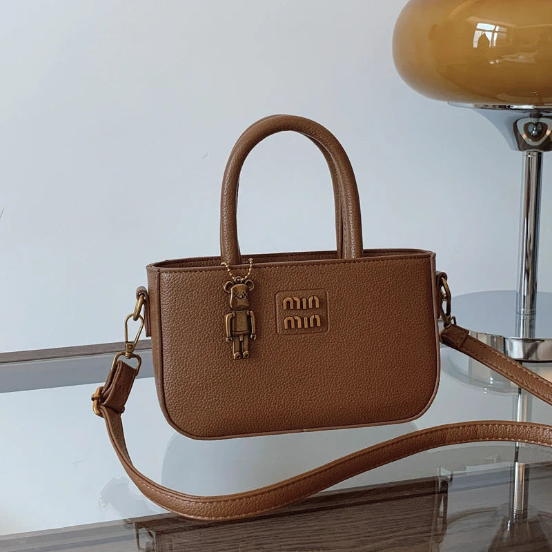 Aura Chic Brown PU Leather Crossbody Bag | Aesthetic Top Handle Handbag with Bear Charm