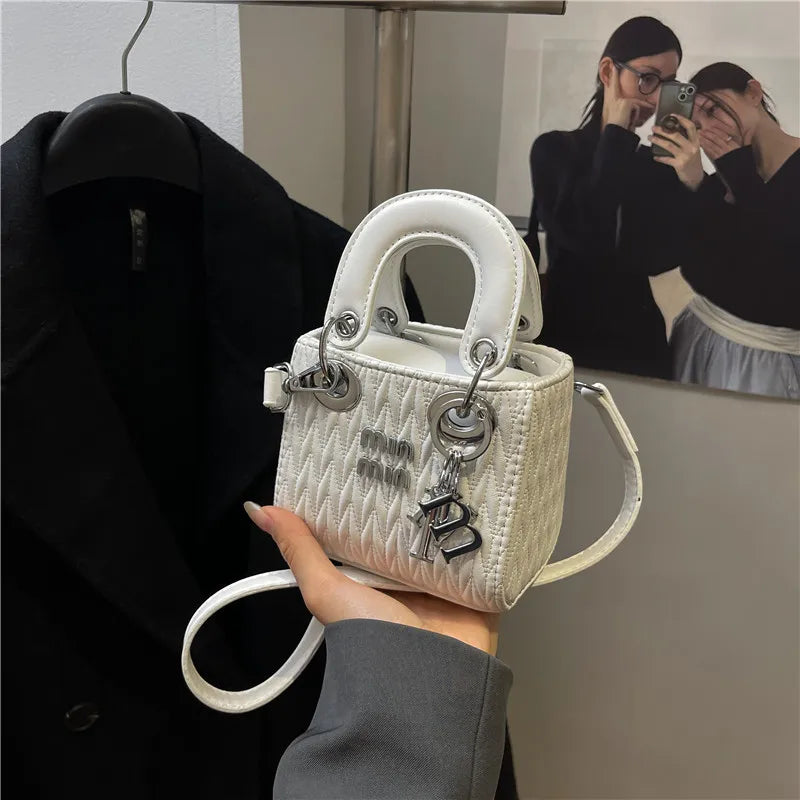 Chic Quilted Mini Handbag with Silver Hardware & Letter Charm