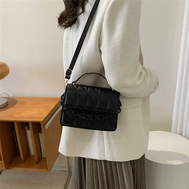 Metallic Silver Quilted Crossbody Bag with Chain Detail