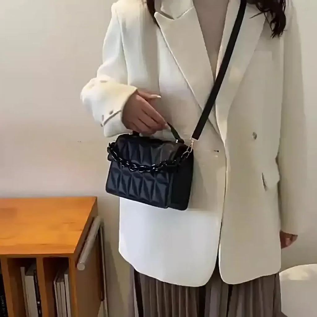 Metallic Silver Quilted Crossbody Bag with Chain Detail