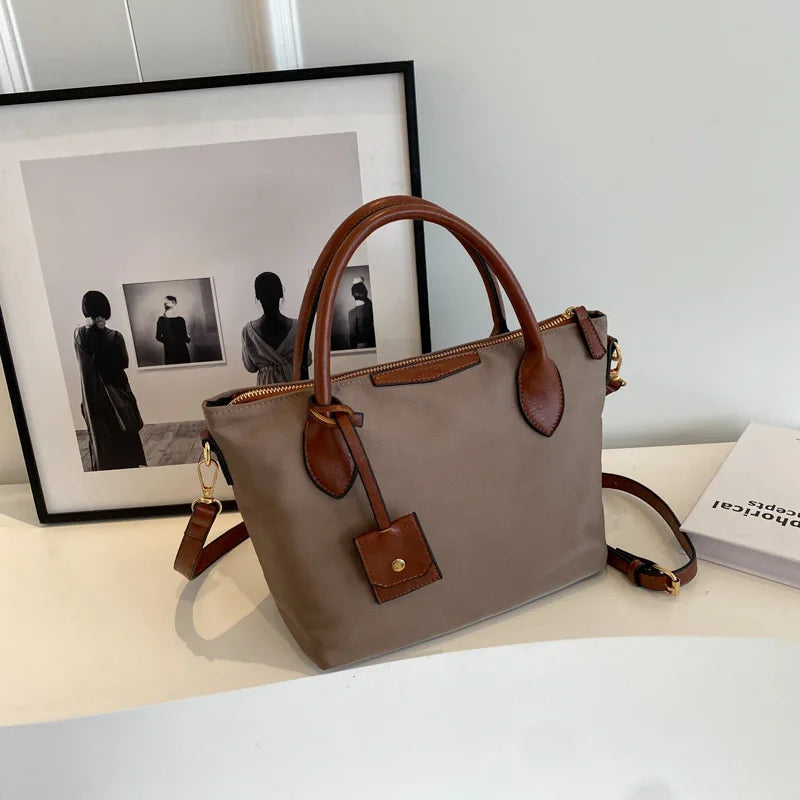 Women’s Waterproof Nylon Handbag with PU Leather Trim & Adjustable Crossbody Strap