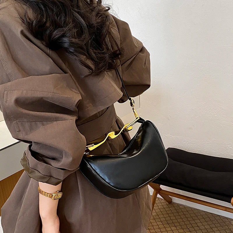 Aura Bags Luxurious Maroon Vegan Leather Handbag with Sculpted Gold Handle