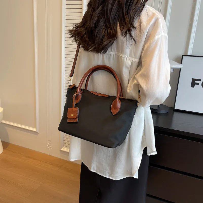 Women’s Waterproof Nylon Handbag with PU Leather Trim & Adjustable Crossbody Strap