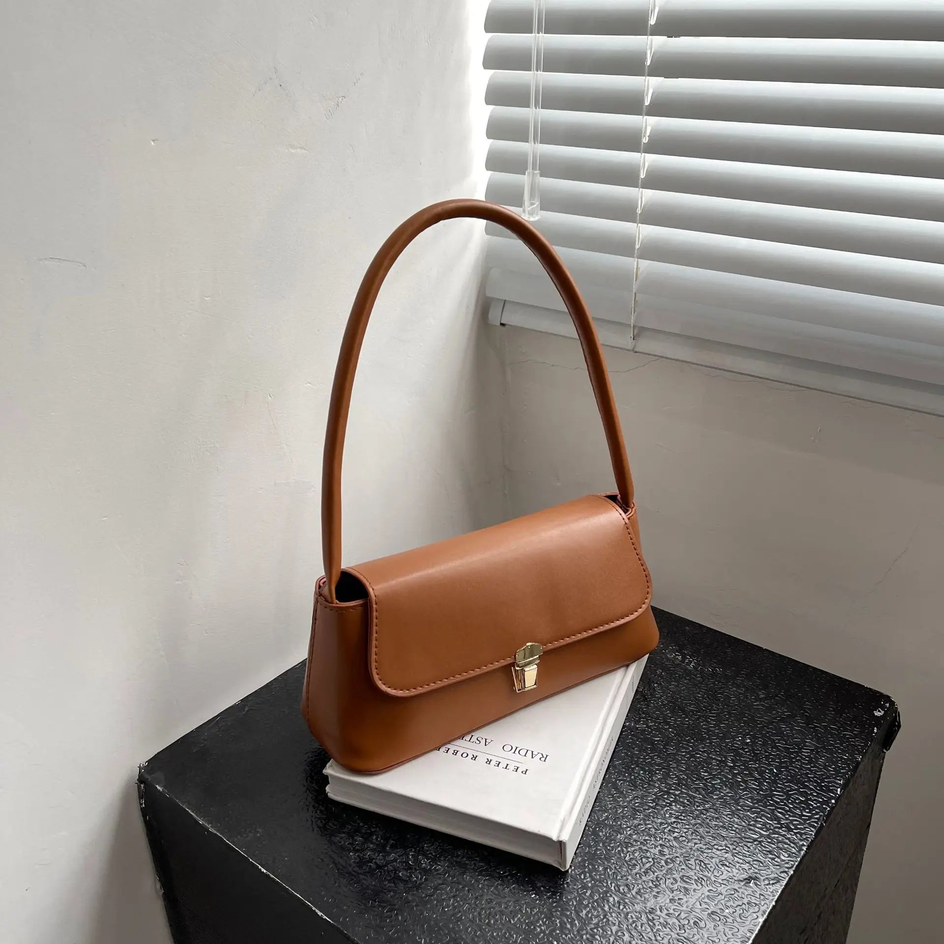 Minimalist Beige Leather Baguette Shoulder Bag with Gold Lock Accent