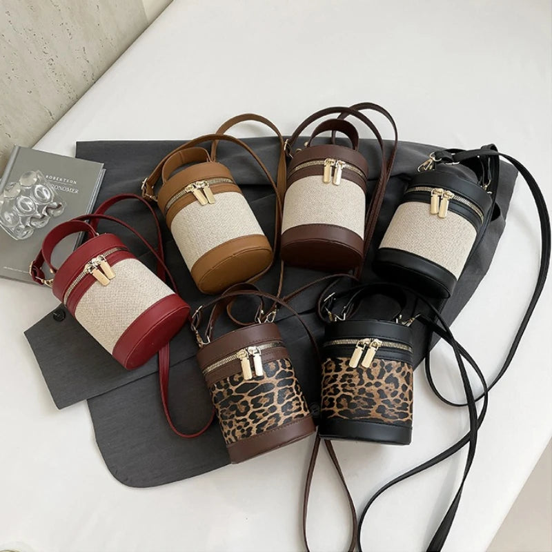 Chic Cylindrical Bucket Crossbody Bag with Top Handle and Zipper Closure