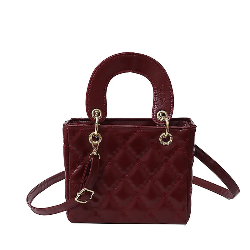 Aura Bags Glossy Red Quilted Handbag with Golden Key Charm & Detachable Strap