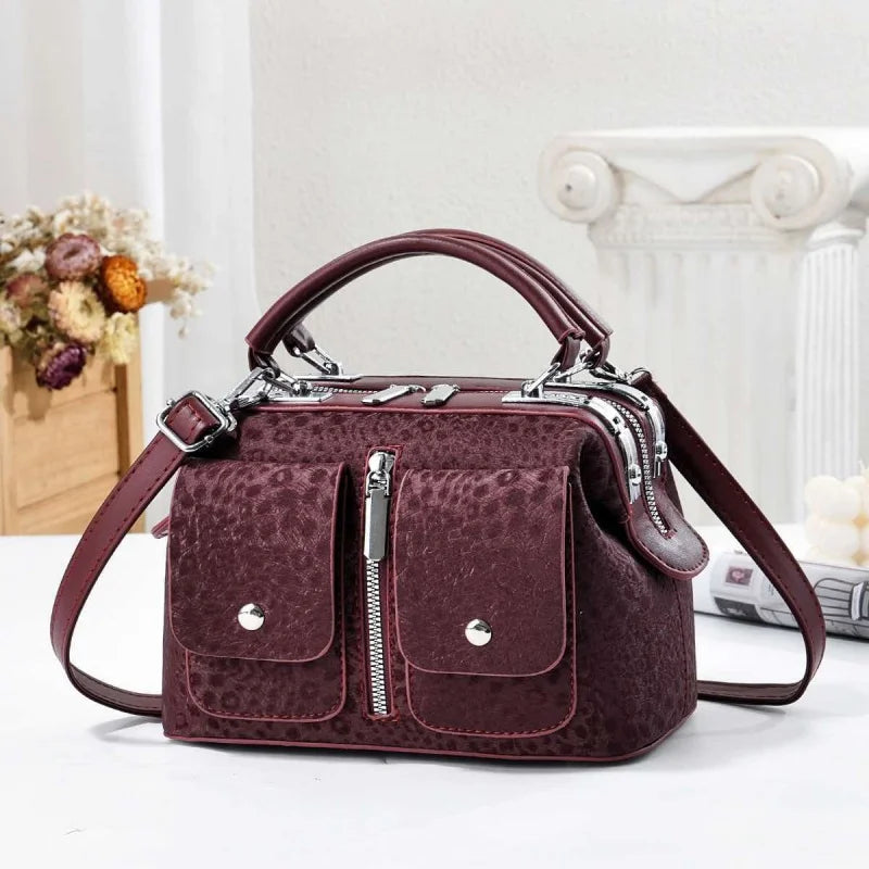 Edgy Multi-Pocket Textured Top-Handle Handbag with Silver Hardware and Crossbody Strap