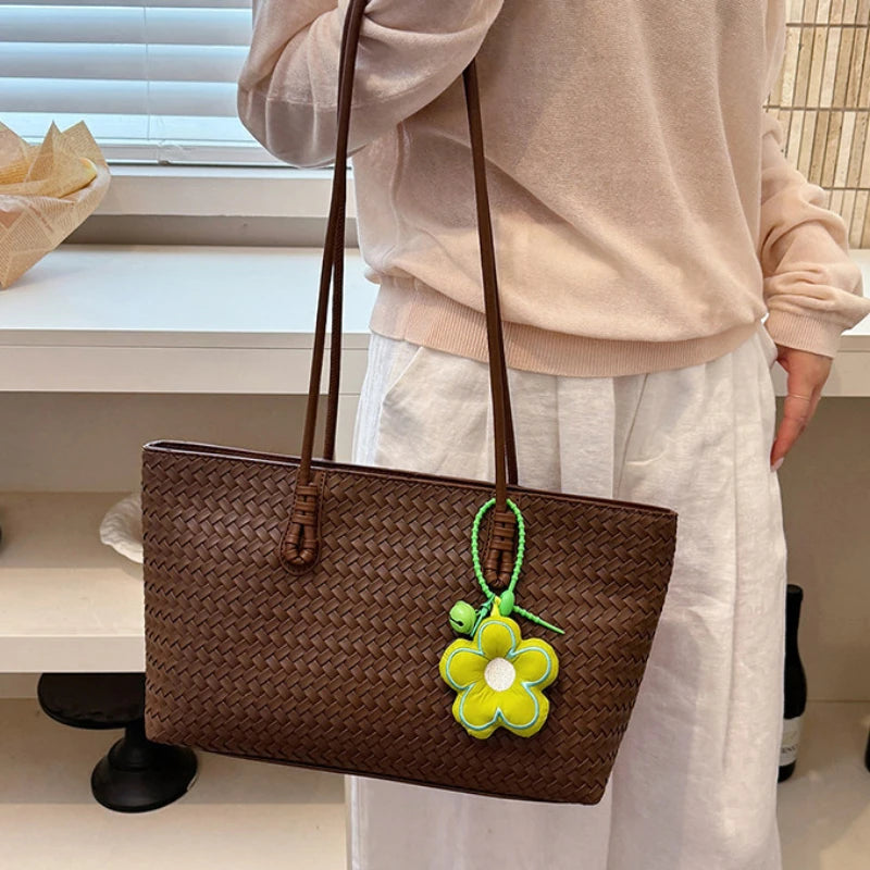 Elegant Woven Leather Tote Bag with Cute Flower Pendant and Long Shoulder Straps