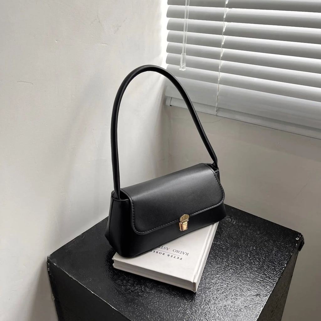 Minimalist Beige Leather Baguette Shoulder Bag with Gold Lock Accent