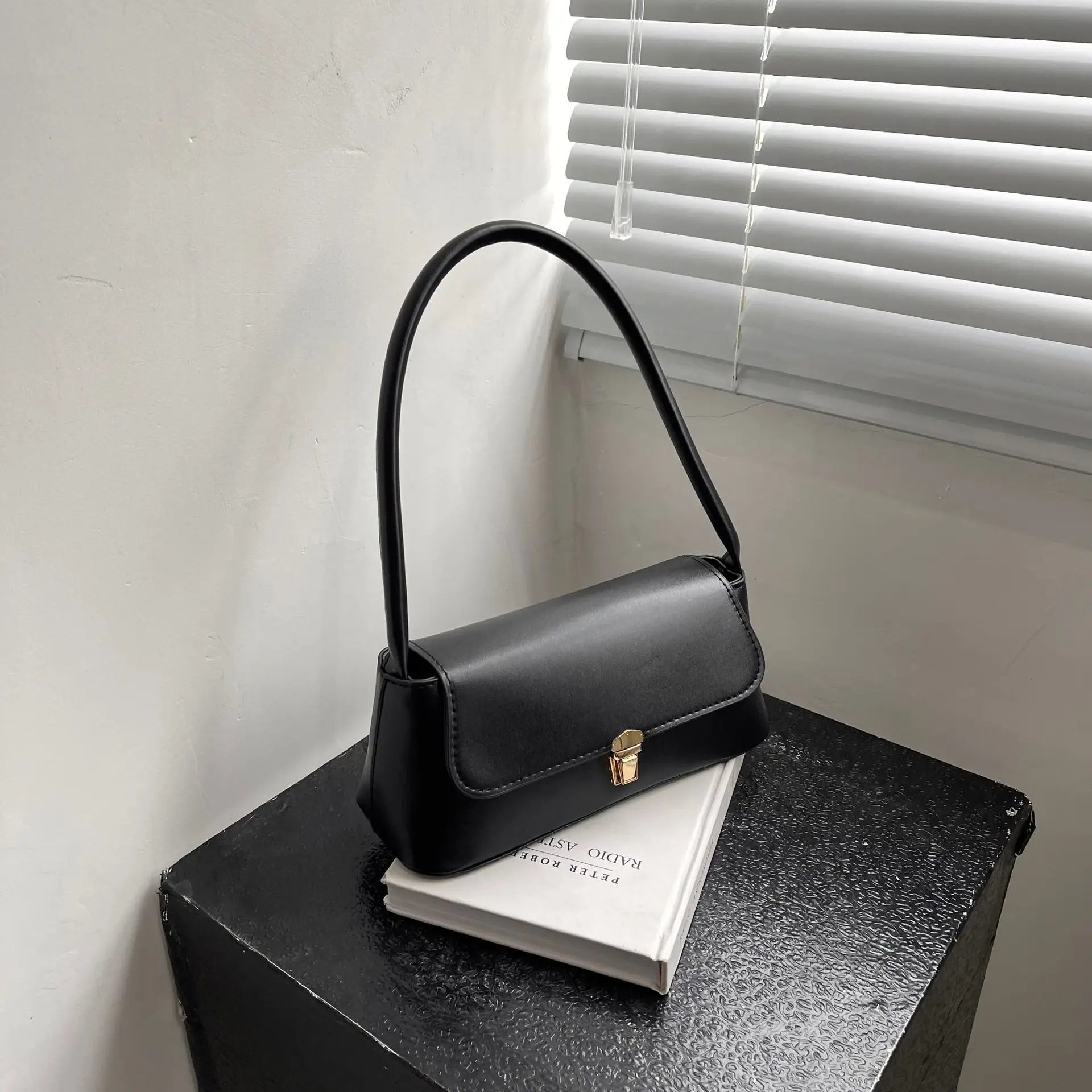 Minimalist Beige Leather Baguette Shoulder Bag with Gold Lock Accent