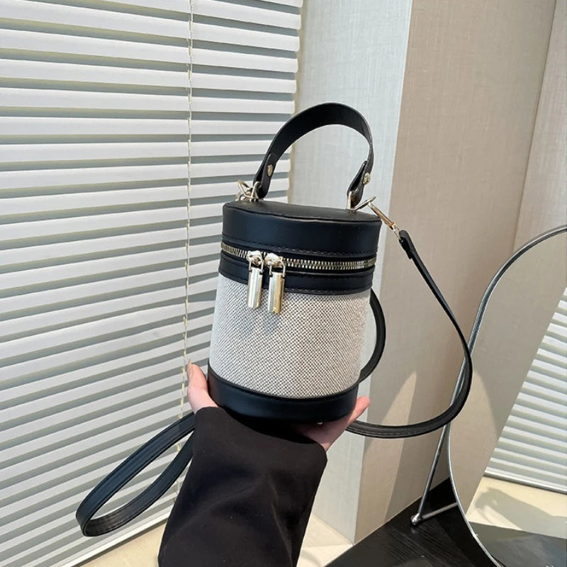 Chic Cylindrical Bucket Crossbody Bag with Top Handle and Zipper Closure