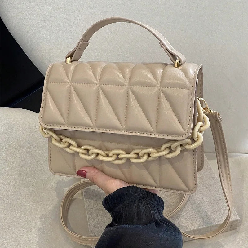 Metallic Silver Quilted Crossbody Bag with Chain Detail