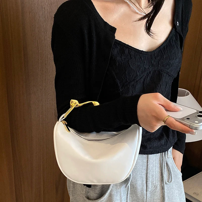 Aura Bags Luxurious Maroon Vegan Leather Handbag with Sculpted Gold Handle