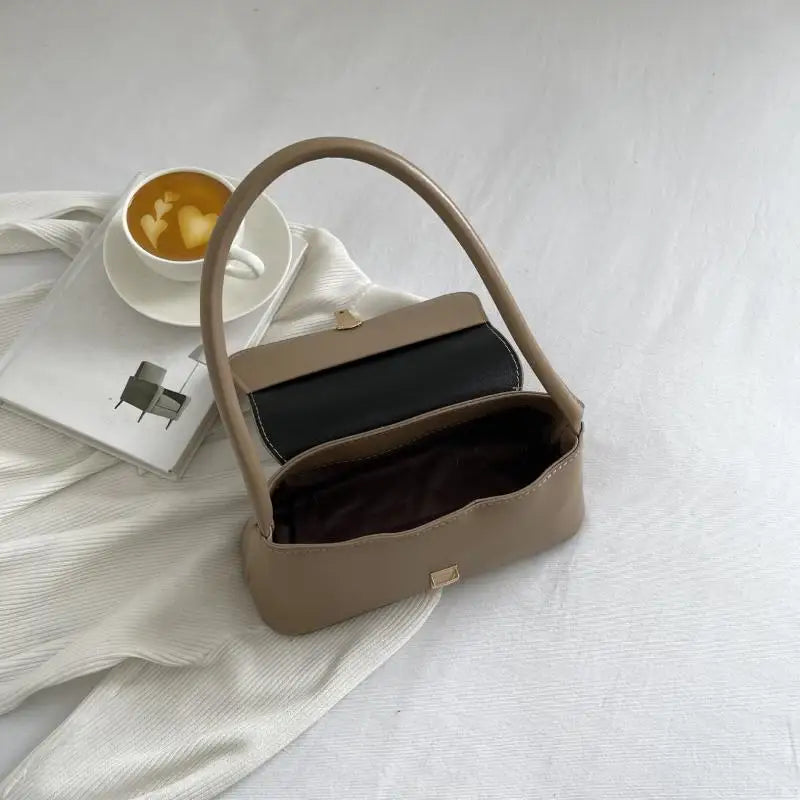 Minimalist Beige Leather Baguette Shoulder Bag with Gold Lock Accent