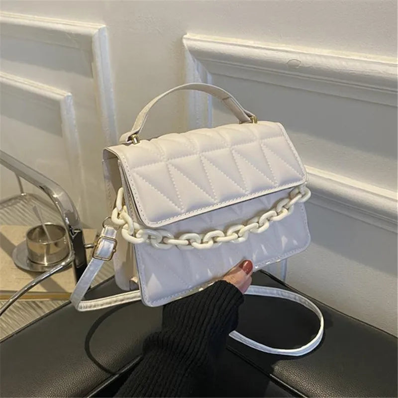 Metallic Silver Quilted Crossbody Bag with Chain Detail