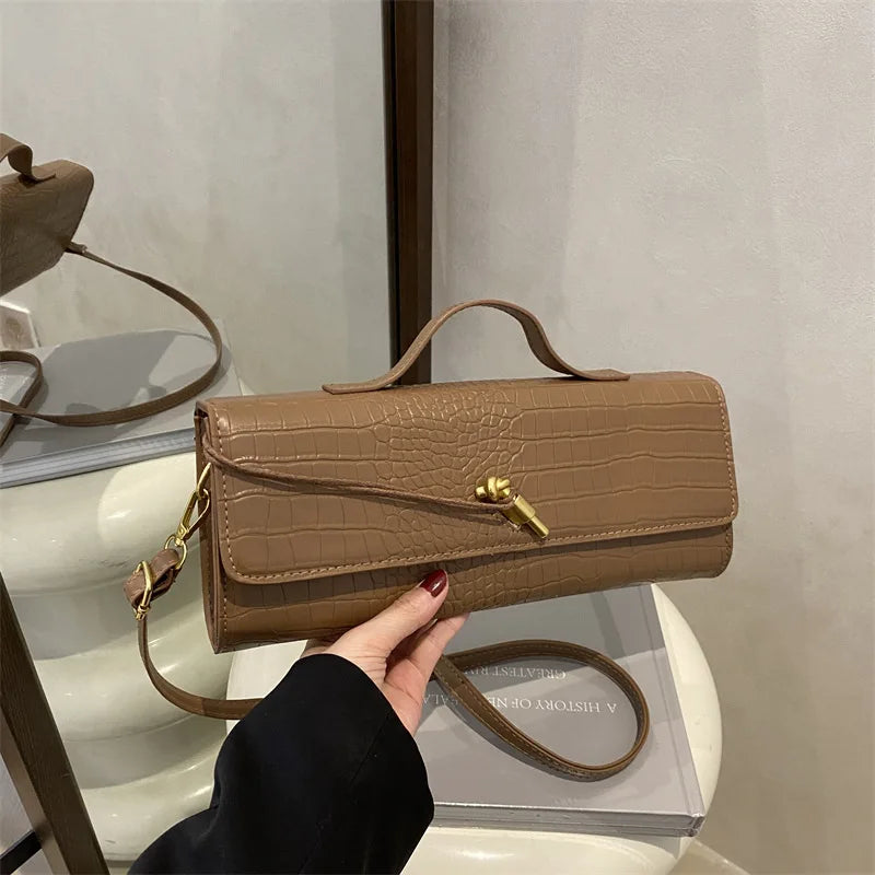 Chic Crocodile Pattern Elongated Shoulder Bag for Women | Elegant Top Handle & Crossbody Handbag with Lock Detail