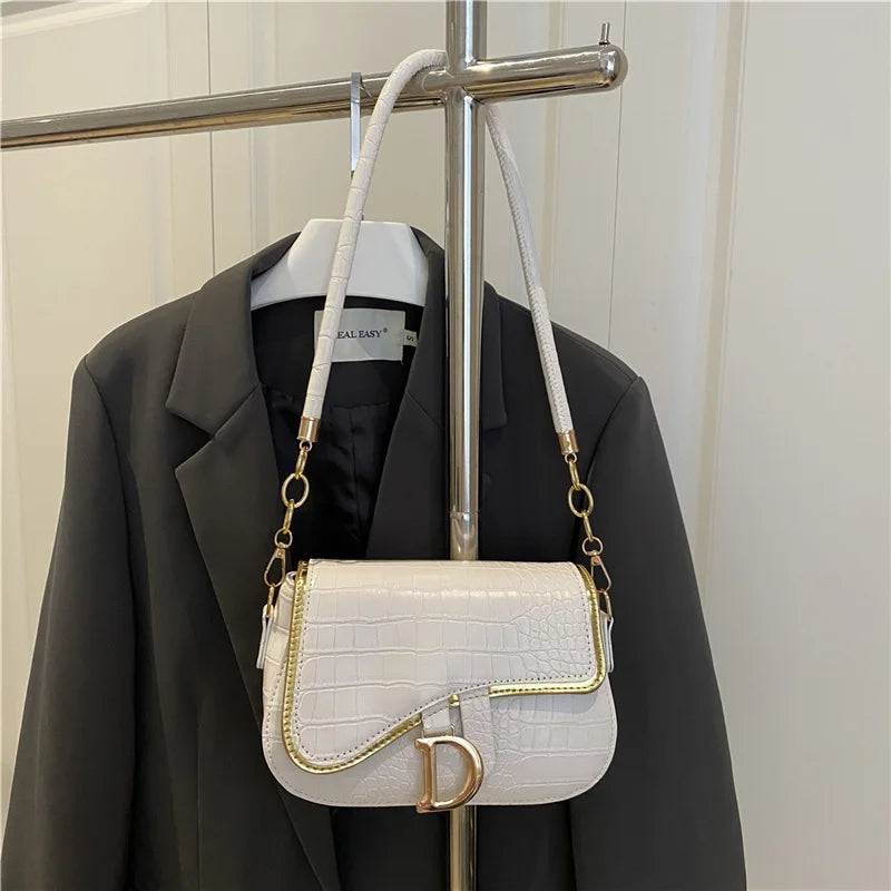 Elegant Crocodile Pattern Saddle Shoulder Bag with Gold "D" Accent and Strap