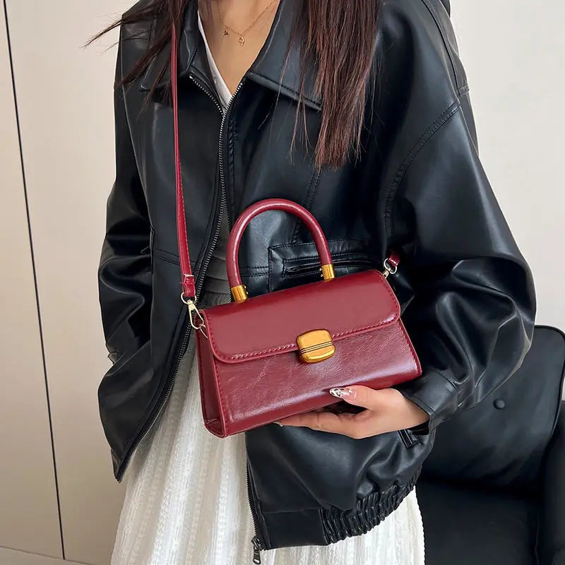Structured Burgundy Crossbody Bag with Gold Lock Clasp | Chic Top-Handle Purse