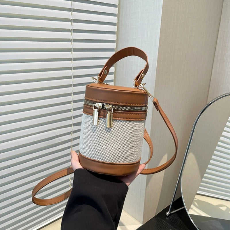 Chic Cylindrical Bucket Crossbody Bag with Top Handle and Zipper Closure