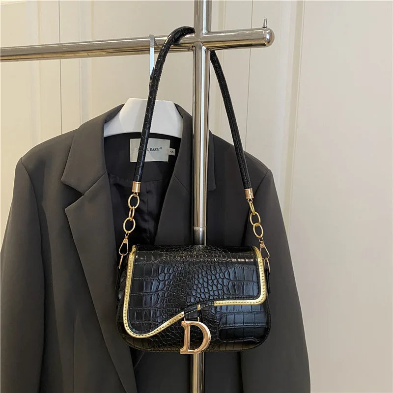 Elegant Crocodile Pattern Saddle Shoulder Bag with Gold "D" Accent and Strap