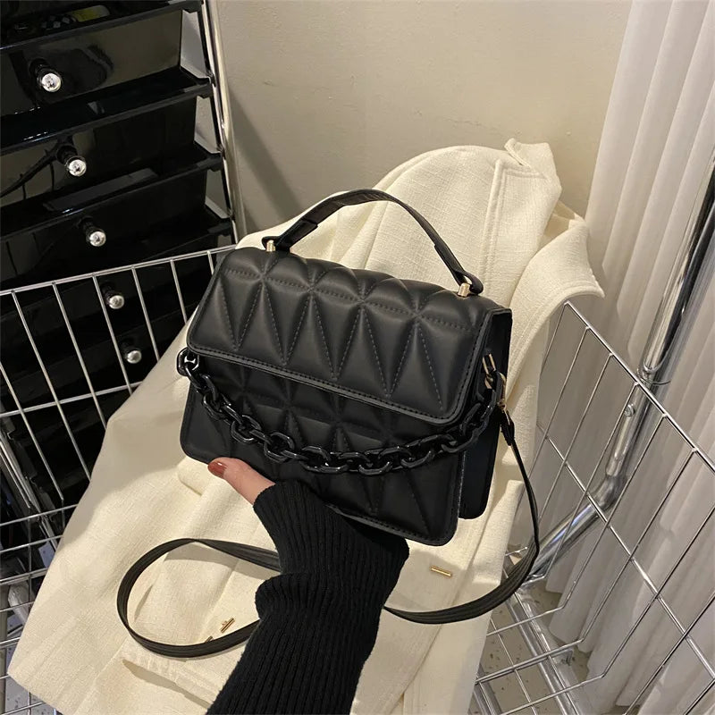 Metallic Silver Quilted Crossbody Bag with Chain Detail