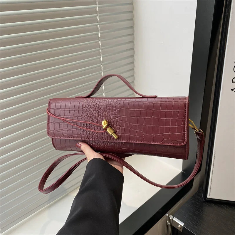 Chic Crocodile Pattern Elongated Shoulder Bag for Women | Elegant Top Handle & Crossbody Handbag with Lock Detail