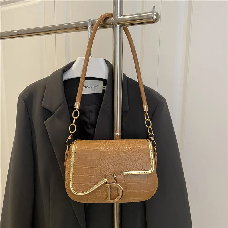 Elegant Crocodile Pattern Saddle Shoulder Bag with Gold "D" Accent and Strap