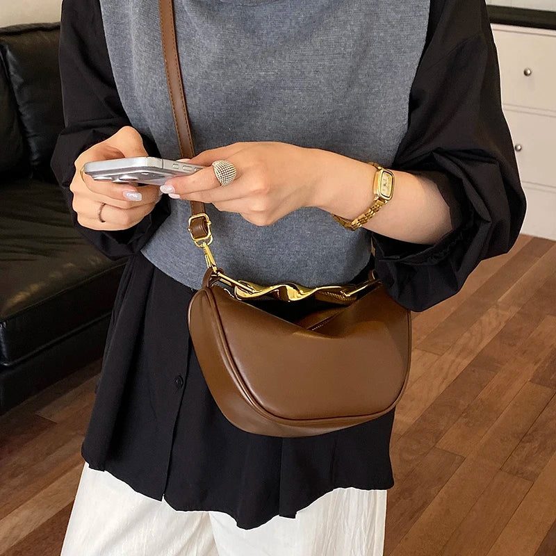 Aura Bags Luxurious Maroon Vegan Leather Handbag with Sculpted Gold Handle