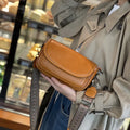 Vintage PU Leather Saddle Crossbody Bag with Wide Woven Guitar Strap
