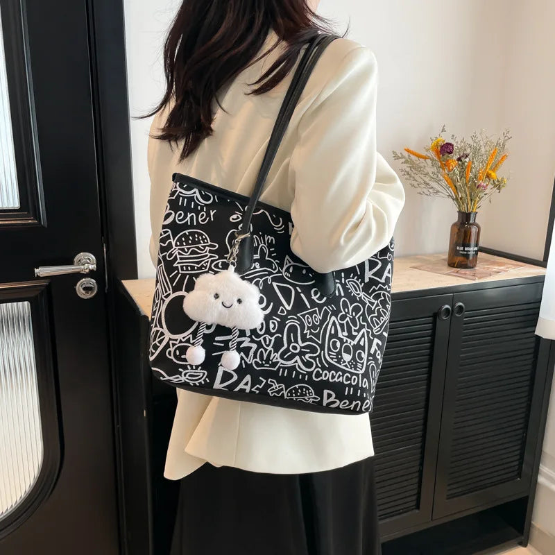 Trendy Graffiti Print Canvas Tote Bag with Cute Cloud Pendant & Shoulder Straps