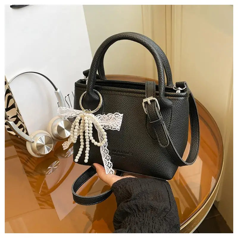 Chic Yellow Pebbled Leather Crossbody Bag with Pearl Bow Charm – Cute Top Handle Satchel