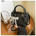 Chic Yellow Pebbled Leather Crossbody Bag with Pearl Bow Charm – Cute Top Handle Satchel