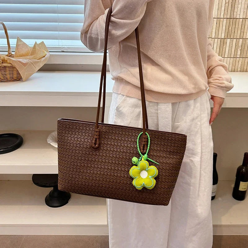 Elegant Woven Leather Tote Bag with Cute Flower Pendant and Long Shoulder Straps