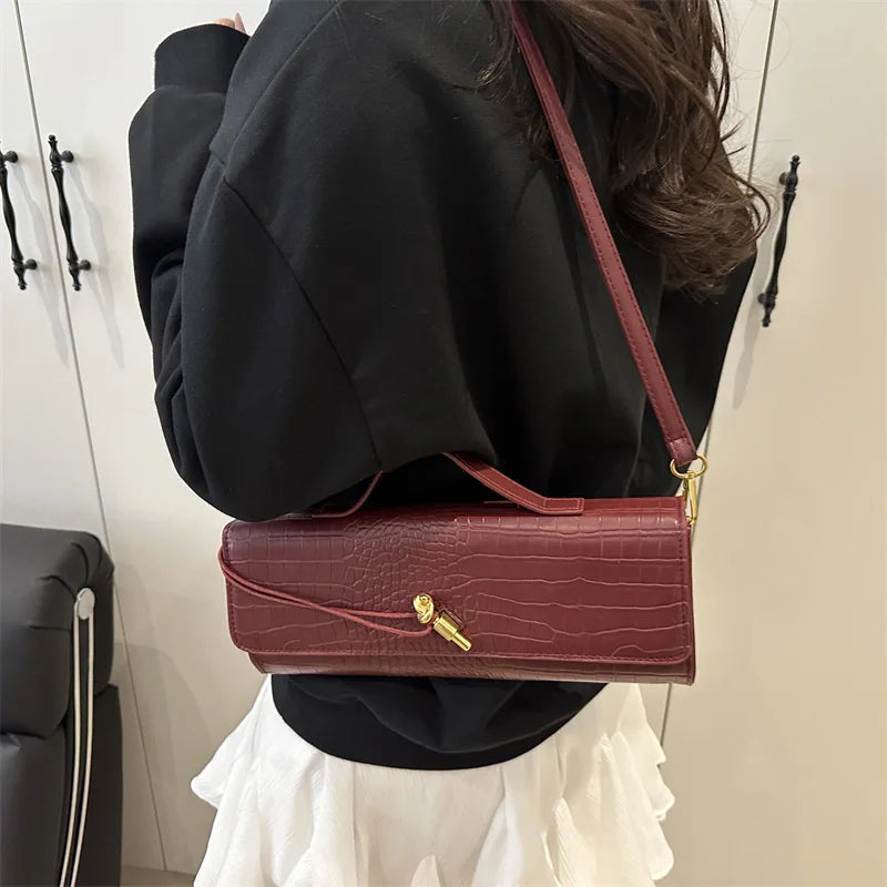 Chic Crocodile Pattern Elongated Shoulder Bag for Women | Elegant Top Handle & Crossbody Handbag with Lock Detail