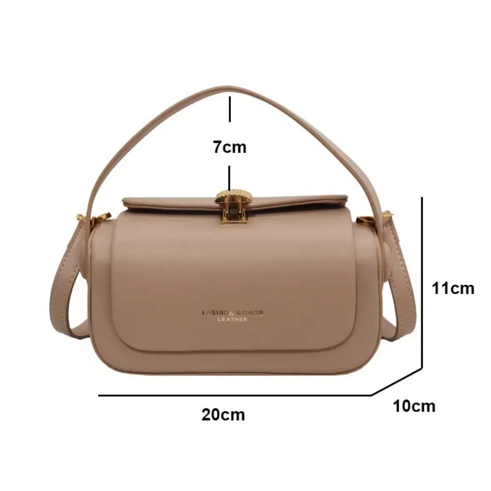Elegant Black Box Handbag with Gold Clasp and Adjustable Strap