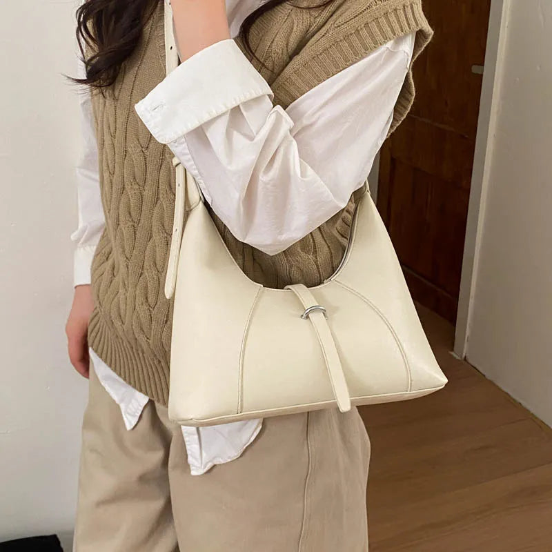 Aura Bags Chic Minimalist Beige Crescent Shoulder Bag with Buckle Detail
