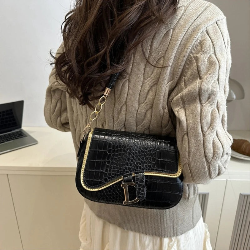 Elegant Crocodile Pattern Saddle Shoulder Bag with Gold "D" Accent and Strap