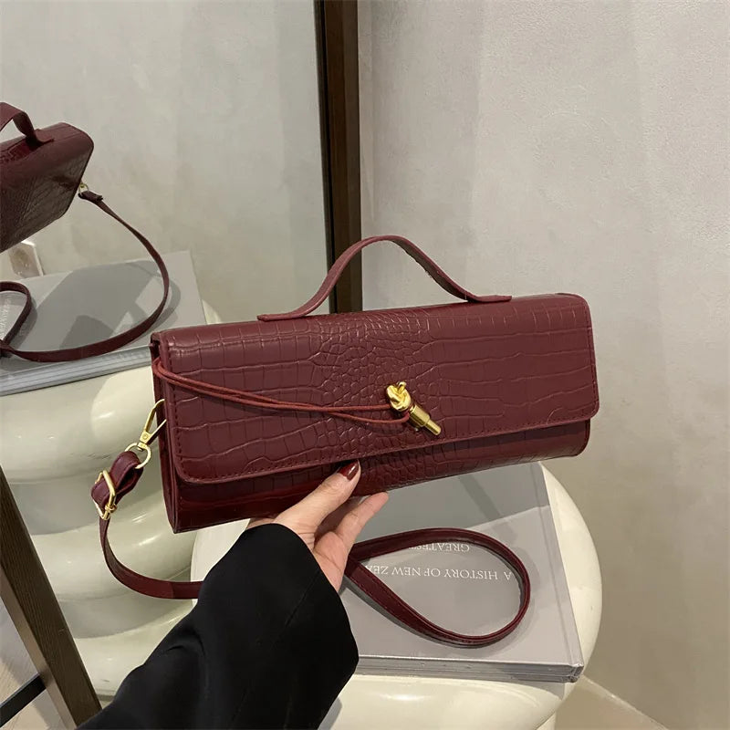 Chic Crocodile Pattern Elongated Shoulder Bag for Women | Elegant Top Handle & Crossbody Handbag with Lock Detail