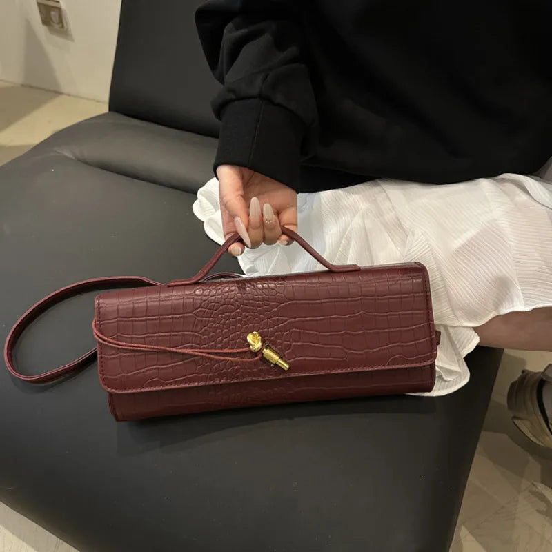Chic Crocodile Pattern Elongated Shoulder Bag for Women | Elegant Top Handle & Crossbody Handbag with Lock Detail
