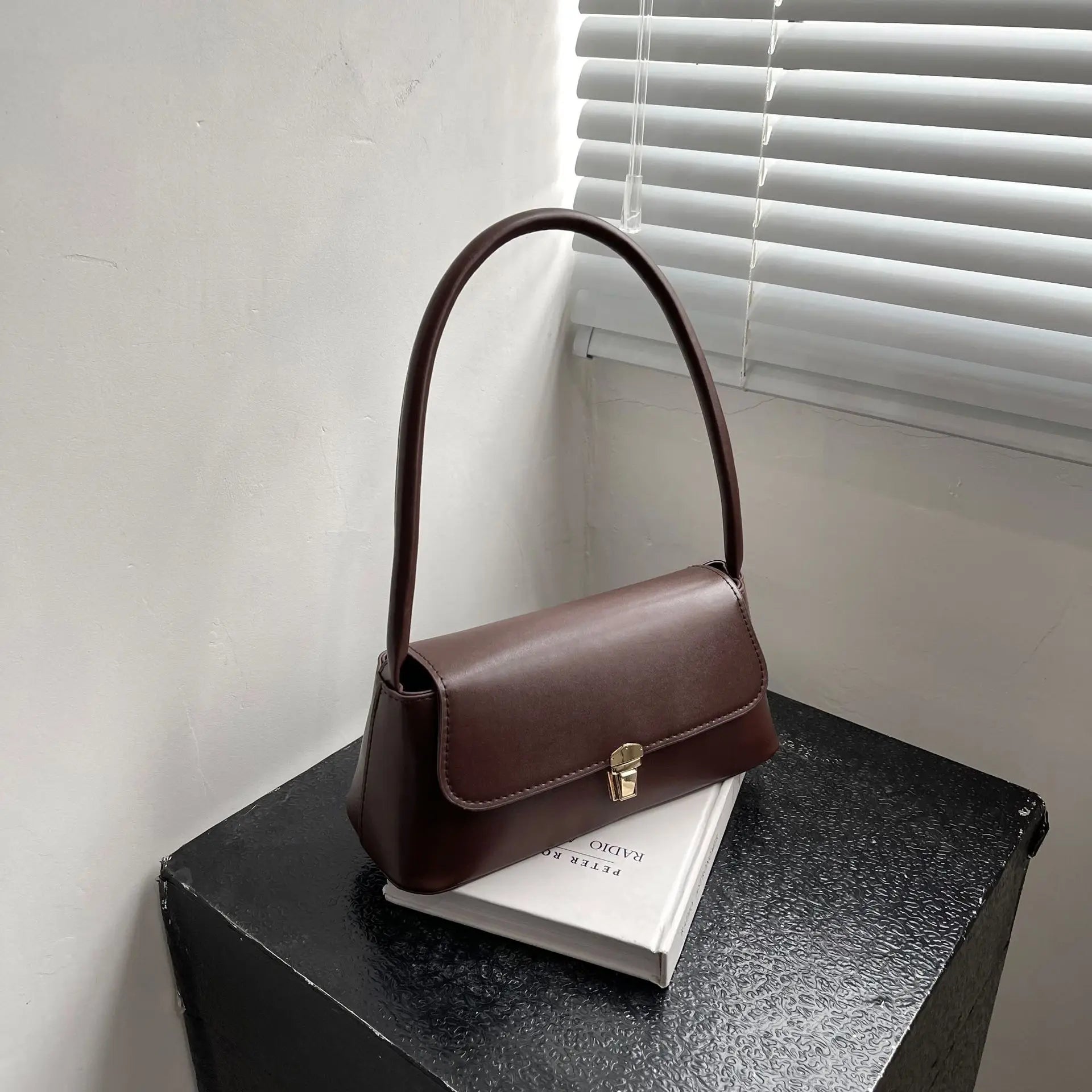 Minimalist Beige Leather Baguette Shoulder Bag with Gold Lock Accent