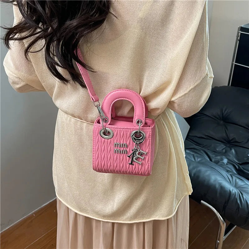 Chic Quilted Mini Handbag with Silver Hardware & Letter Charm