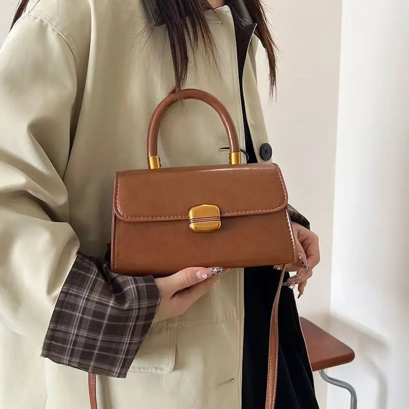 Structured Burgundy Crossbody Bag with Gold Lock Clasp | Chic Top-Handle Purse
