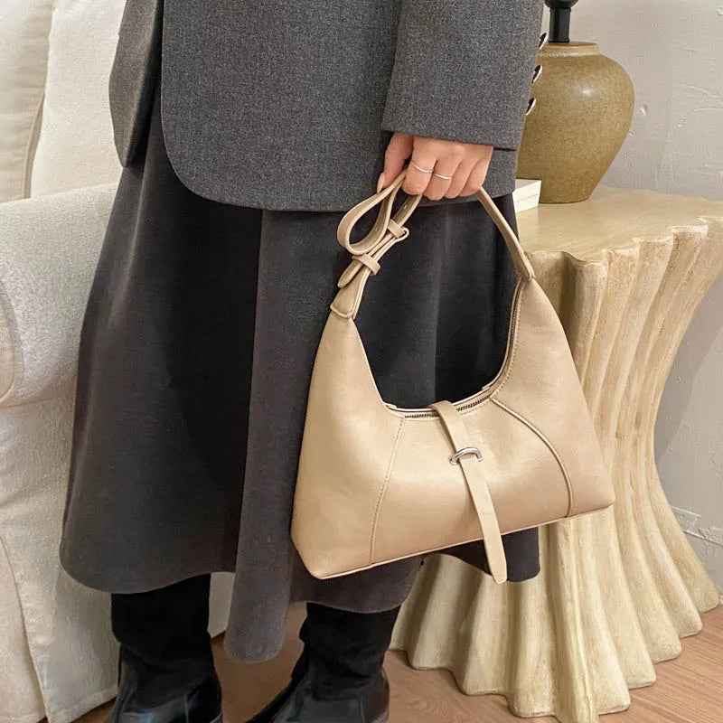 Aura Bags Chic Minimalist Beige Crescent Shoulder Bag with Buckle Detail