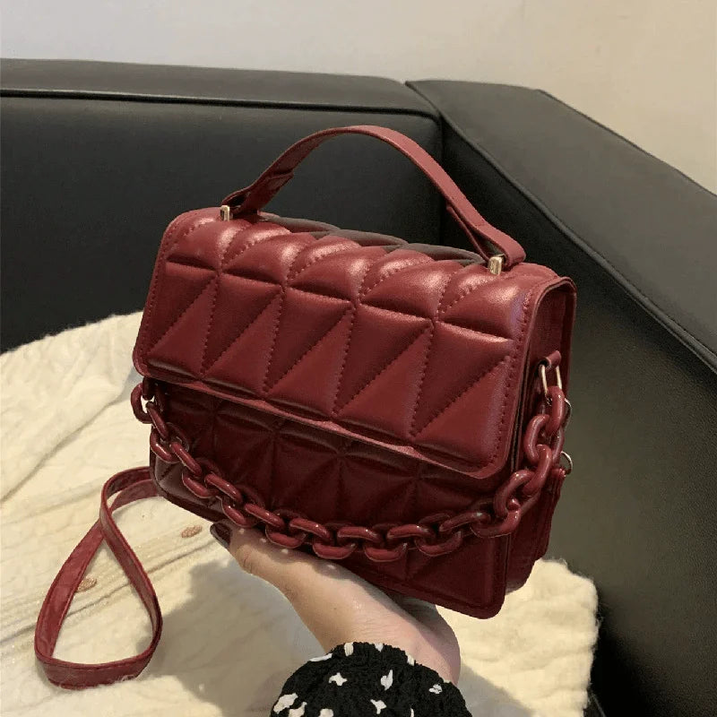 Metallic Silver Quilted Crossbody Bag with Chain Detail